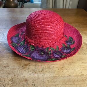 Vintage red straw sunhat with painted purple flower design